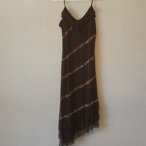 Beaded dress with asymmetrical hem line